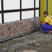 Facing the foundation with siding and other materials