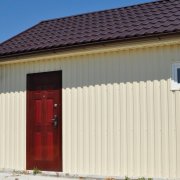 How to fix corrugated board on the wall: consider in detail