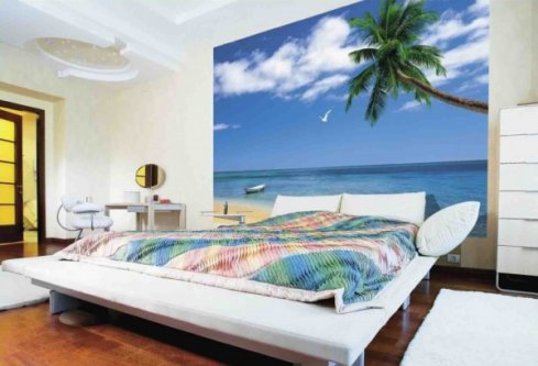 Wall mural with a seascape in a minimalist interior of a youth bedroom