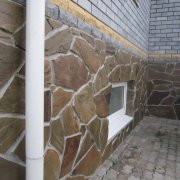 Facing the base with natural stone: types of material and installation steps