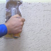 How to plaster drywall and whether to do it