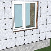 How is the insulation of the walls with polystyrene foam done outside