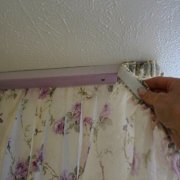 How to install a curtain rod on a wall with your own hands