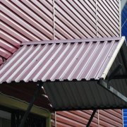 Facing the facade with corrugated board: work