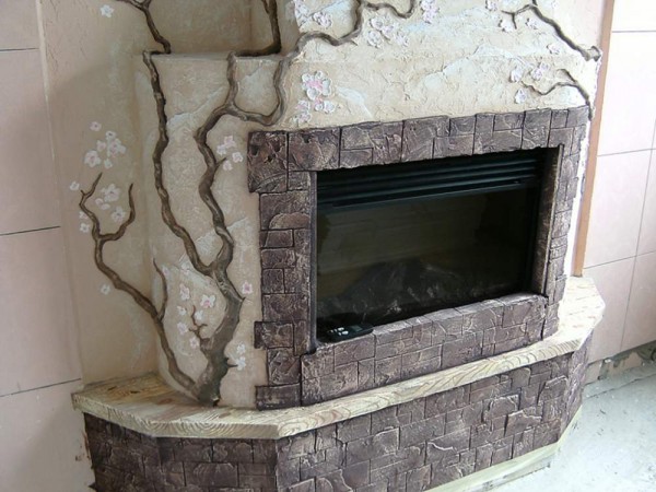 The use of decorative plaster in the decoration of the fireplace