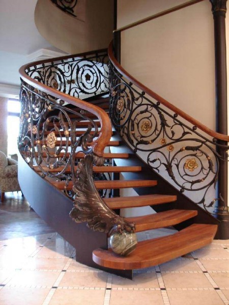 Metal staircase with wooden steps.