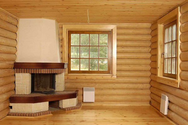 Block house in the interior decoration of a wooden house