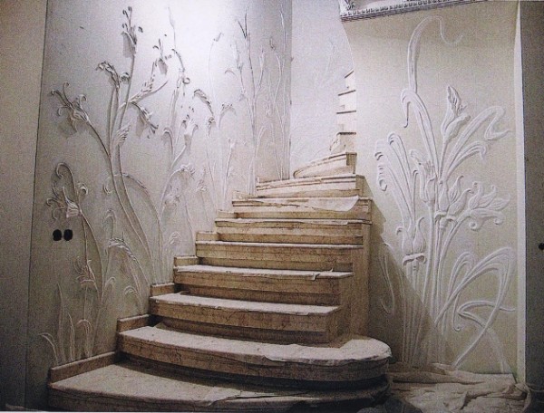 Structural plaster on the wall along the stairs