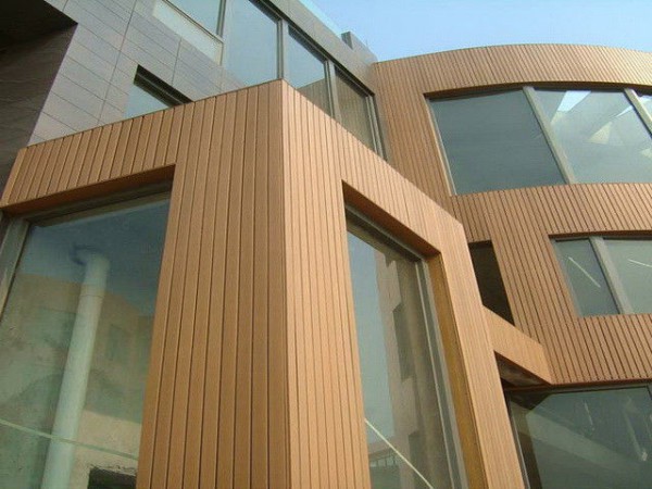 Facade cladding design: a combination of planken and wood panels