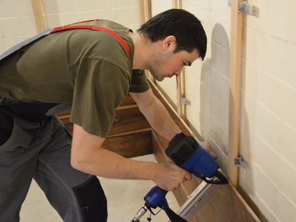 Installation of wood panels on concrete