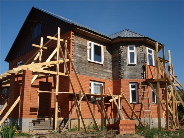 Brick house cladding