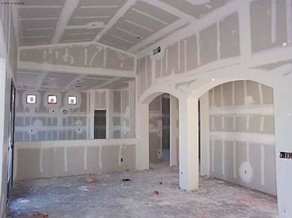 Lining the partitions with drywall