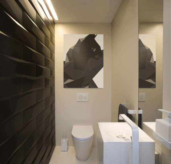 Facing the walls of the bathroom with 3D panels