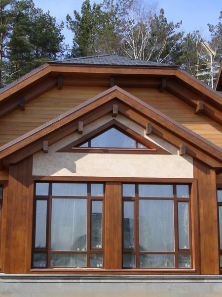 Wood trim on the exterior walls of the house