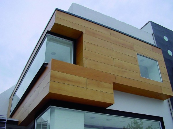 Facade cladding with composite: wood-polymer panels