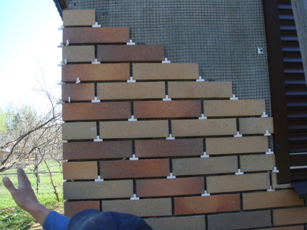 Installation of tiles on the grid