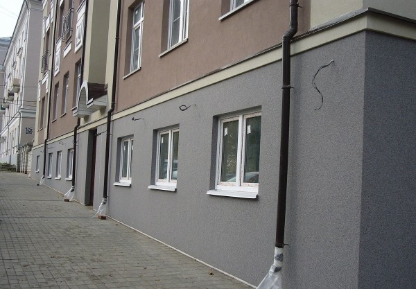 Multi-storey house plastered with marble chips