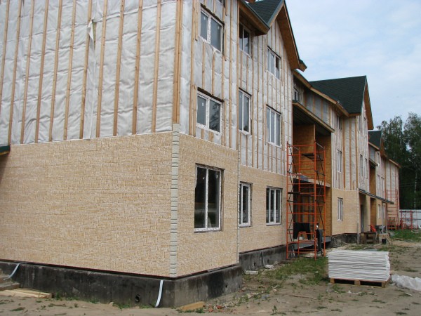 Wall cladding with ceramic siding