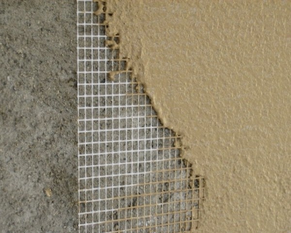 Acrylic plaster over reinforcement mesh