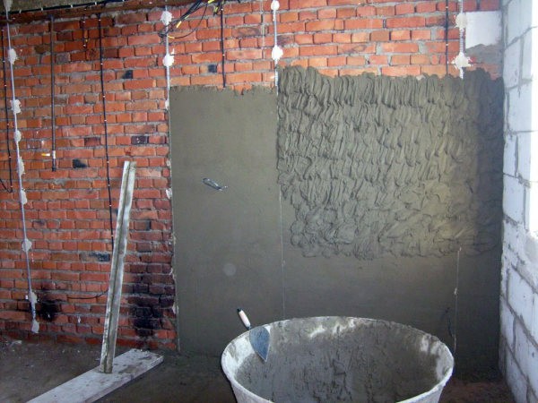 How to plaster walls with cement-sand mortar