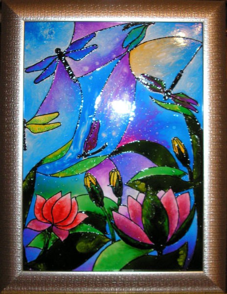 In the photo a stained-glass window made with acrylic stained-glass paints