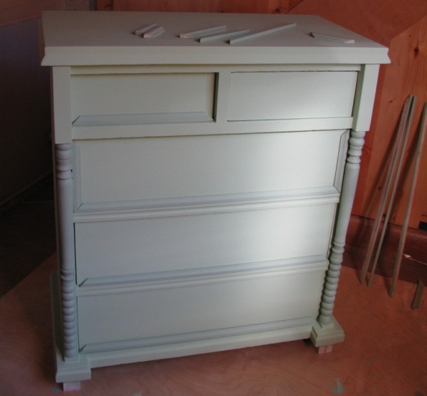 Painted chest of drawers made of wood