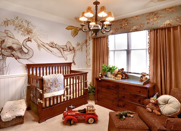 Nursery in brown colors with images of animals on the wallpaper