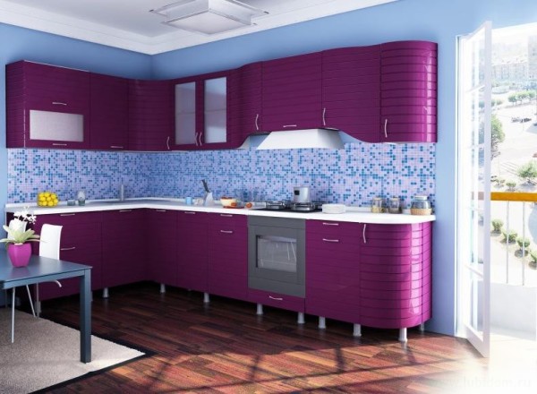 Purple kitchen set against blue walls