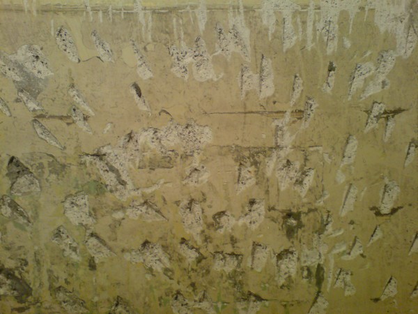 Stucco wall prepared for plaster