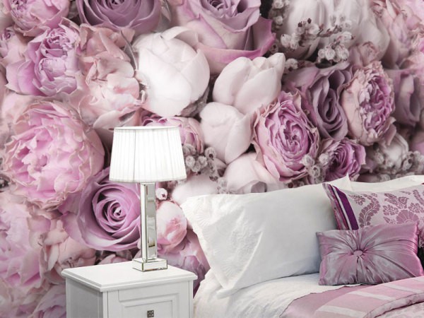 White and pink peonies at the head of the bed