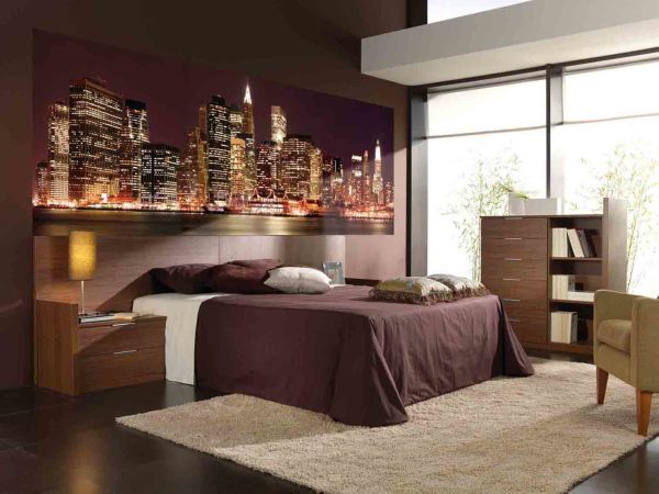 Wall mural night city in bedroom interior