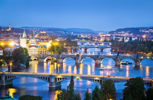 Wall mural overlooking the evening bridges of Prague