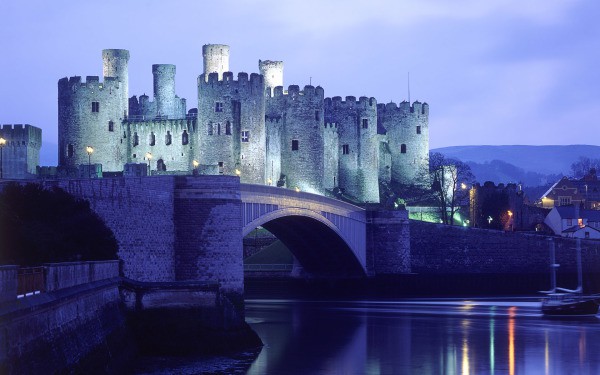 Illuminated English Conwy Castle at night