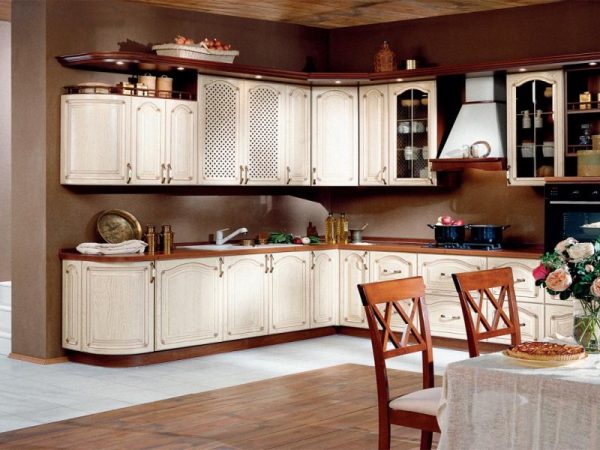 Chocolate color of the walls makes the kitchen more comfortable