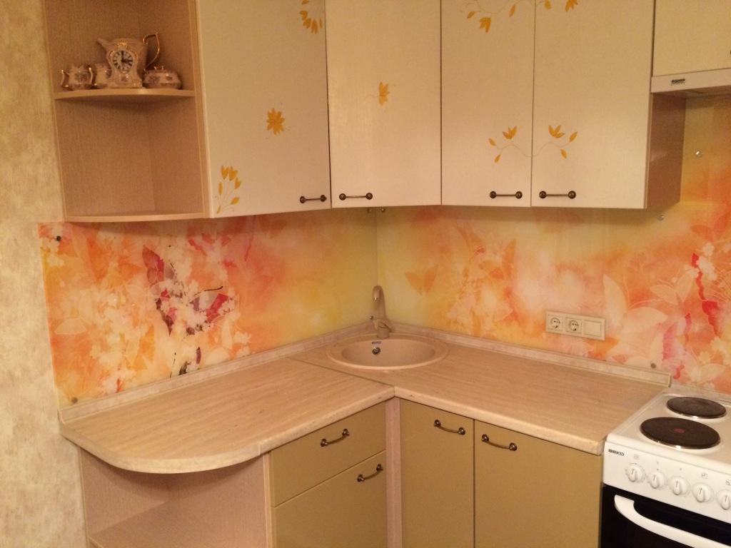 Wall mural with butterflies in the kitchen as a kitchen apron