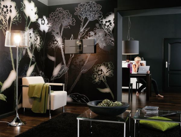 Wall mural white and black flowers in a living room interior