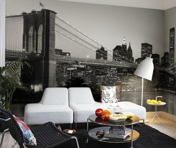 Wall mural with black and white image of the night city and bridge in the interior of a modern living room