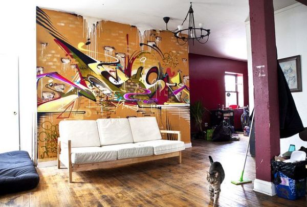 Wall mural with graffiti in the interior of the living room, in the style of a loft