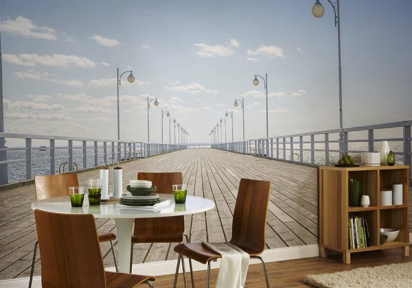 On the photo, wall mural with the image of the pier, in the interior of the dining room