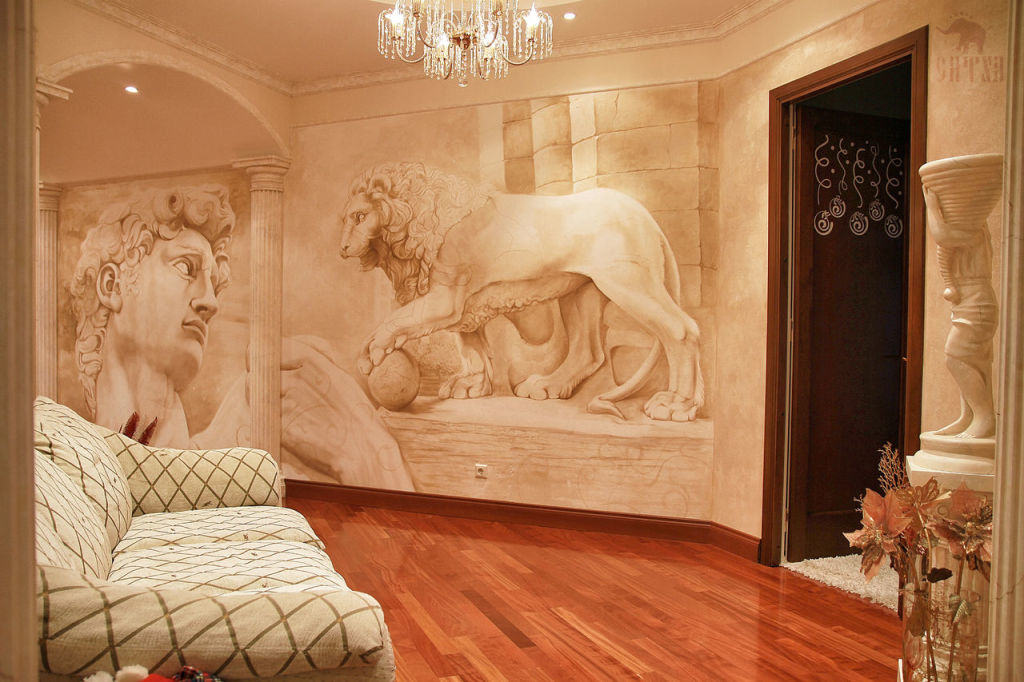 Frescoes depicting antique drawings in an antique interior