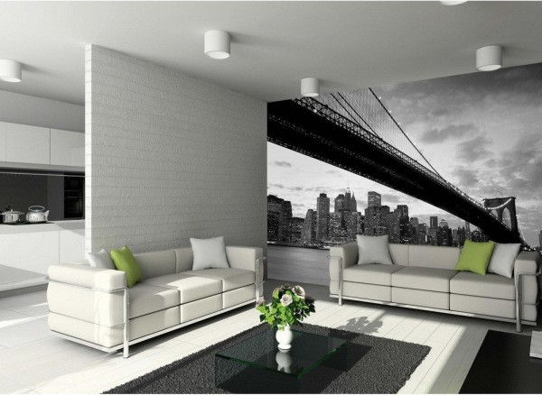 Black and white murals with the image of the Brooklyn Bridge in the interior of the living room