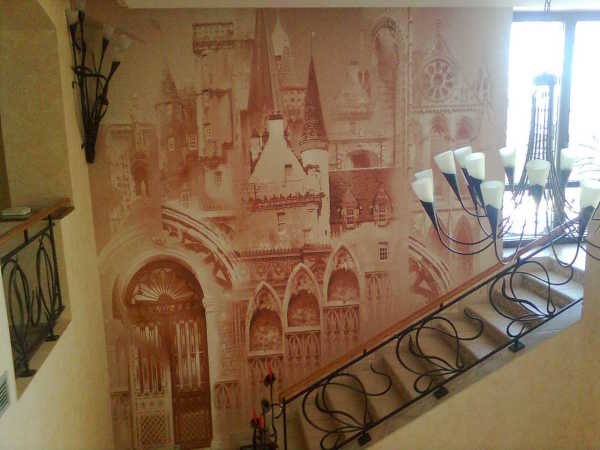 Wall mural fresco decorating an empty wall on the stairs between floors