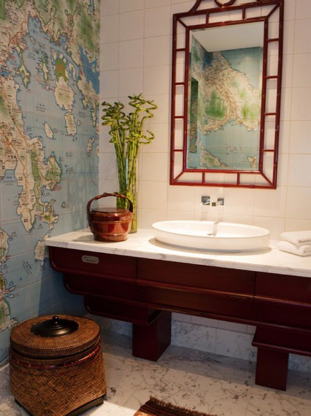 Wall mural with the image of the world map in the interior of the toilet