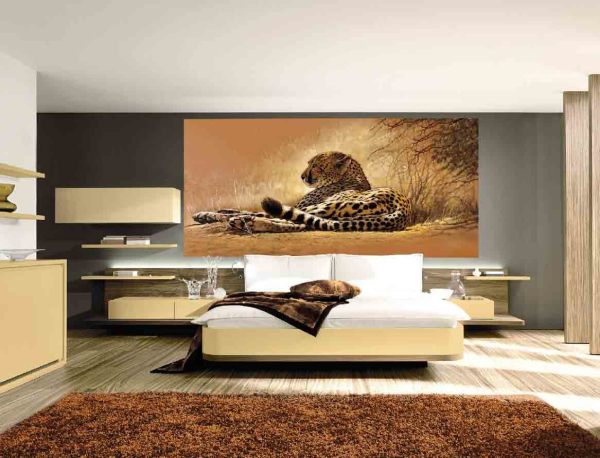 Wall mural depicting a resting leopard in a modern bedroom interior