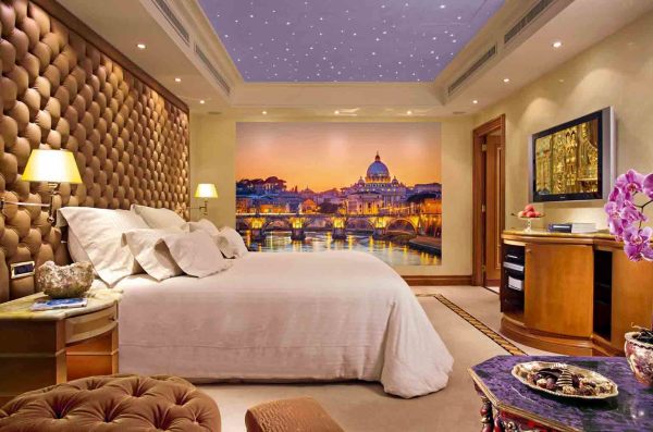 Wall mural with the image of the old city in one of the classic bedroom interiors