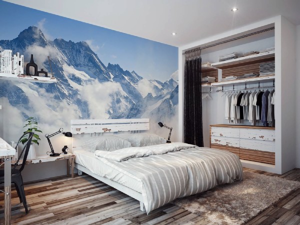 Wall mural with the image of majestic mountains drowning in the clouds