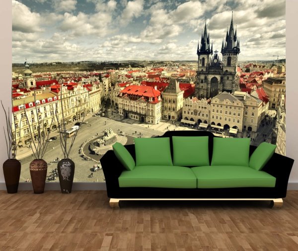 Wall mural with a panoramic image of Prague in the interior of the living room