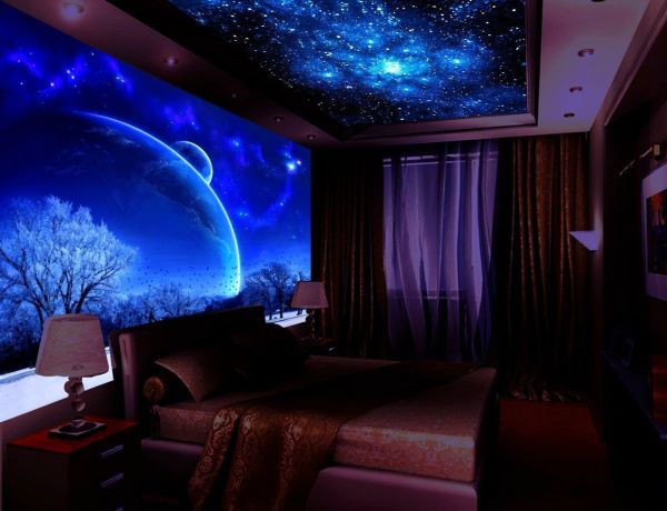 Glow in the dark photo wallpaper on the wall and ceiling of the bedroom