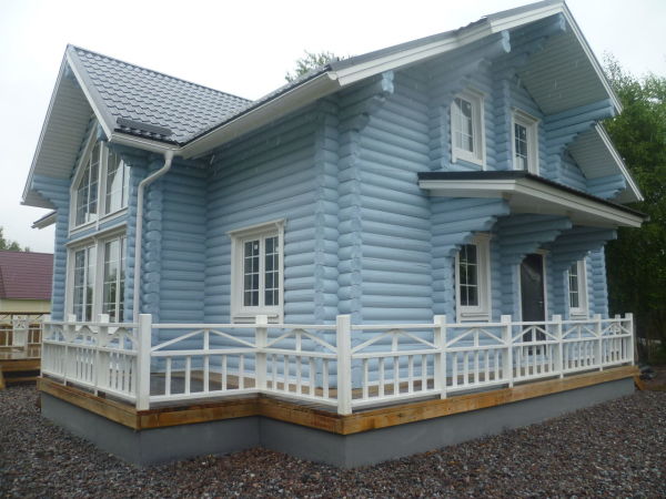 Wooden house with a painted facade