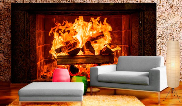 Wall mural with the image of a burning fire in the fireplace, in the interior of the living room